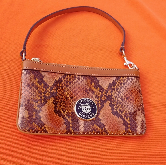Dooney & Bourke Handbags - ✨HOT!!✨Dooney & Bourke Orange & Tan Python Wristlet